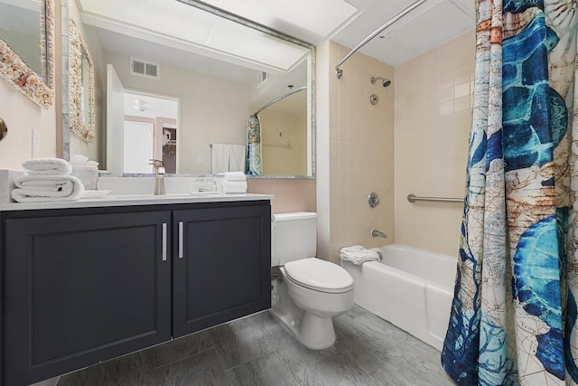 full bathroom with vanity, toilet, and shower / tub combo with curtain