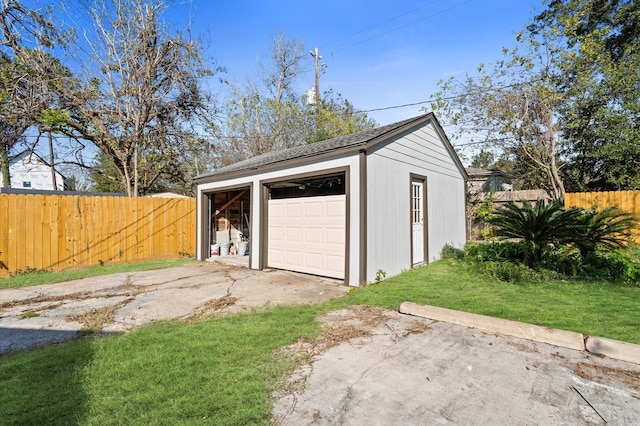 garage with a lawn