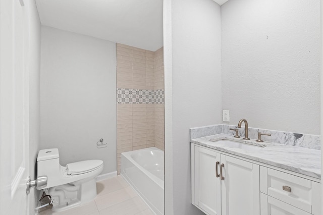 bathroom with tile patterned flooring, vanity, toilet, and a tub