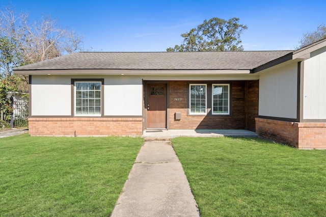 view of front of home with a front yard