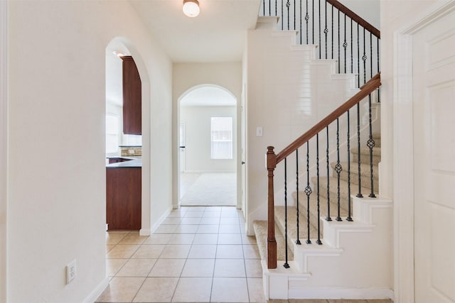 entrance foyer featuring light tile patterned floors