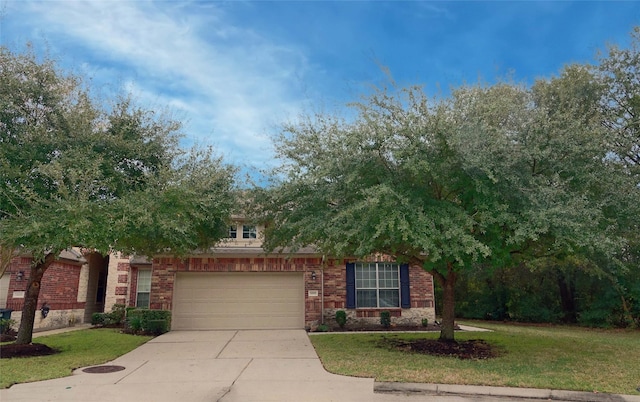 view of front of house with a garage and a front lawn