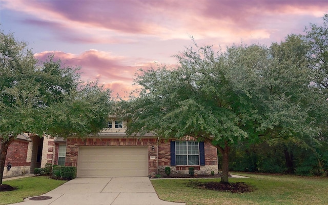 view of front of home with a lawn