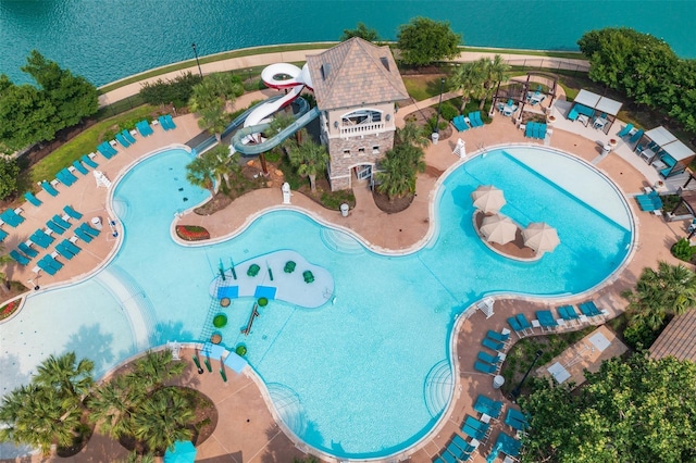 birds eye view of property with a water view