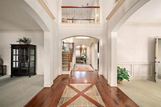 view of carpeted foyer