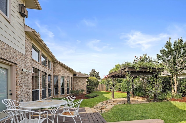 view of yard with a wooden deck