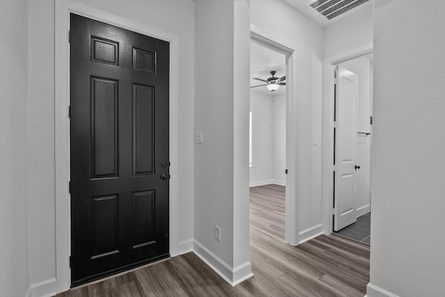 17007 Sweet Iris Ct, Conroe, TX 77302 - foyer with dark wood-type flooring, baseboards, and a ceiling fan