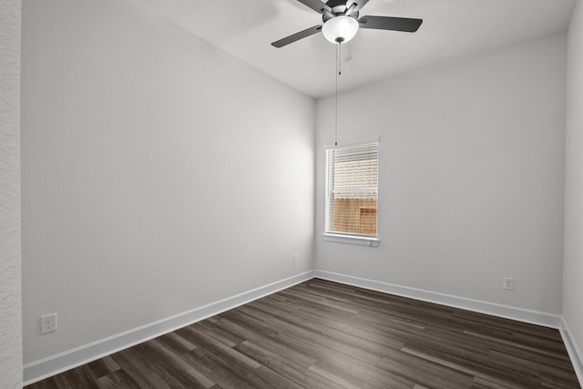 17007 Sweet Iris Ct, Conroe, TX 77302 - unfurnished room with dark wood-type flooring, baseboards, and ceiling fan