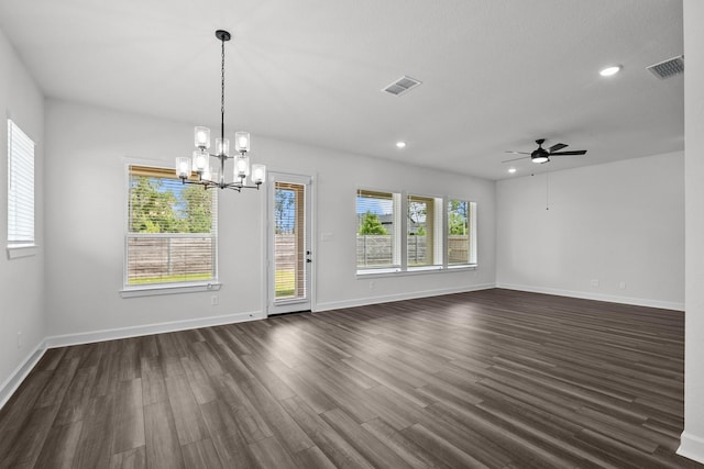 17007 Sweet Iris Ct, Conroe, TX 77302 - spare room featuring dark wood-style floors, ceiling fan, baseboards, a chandelier, and recessed lighting