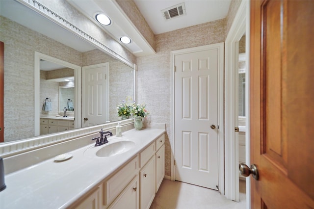 bathroom featuring vanity