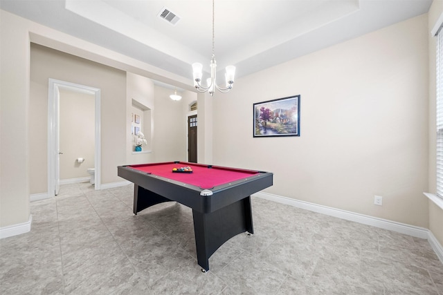 recreation room featuring a notable chandelier, a raised ceiling, and pool table