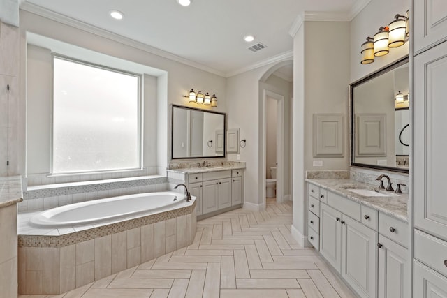 bathroom featuring vanity, toilet, parquet flooring, and crown molding