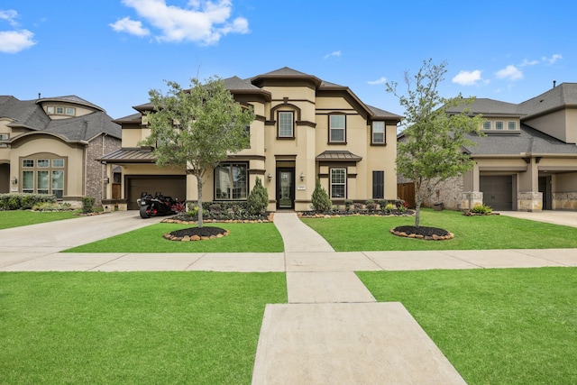 view of front of property featuring a garage and a front lawn