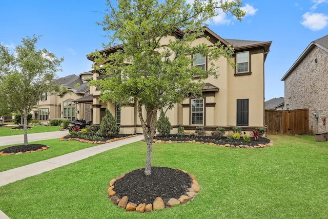 view of front of home featuring a front yard