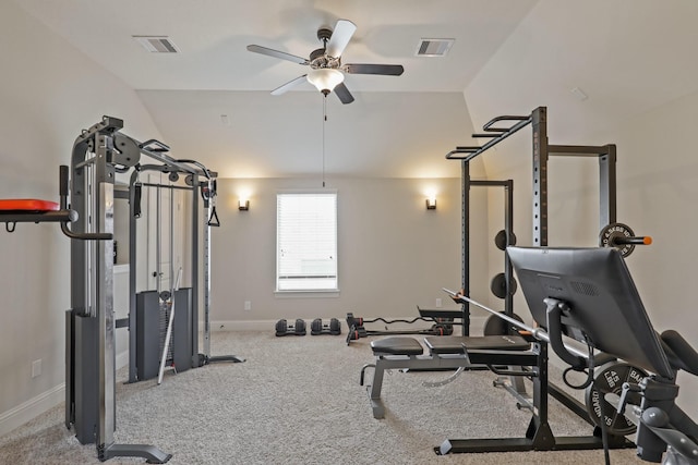 exercise area with ceiling fan, light carpet, and vaulted ceiling