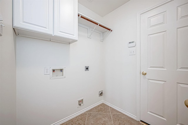 laundry room with washer hookup, cabinet space, light tile patterned flooring, baseboards, and hookup for an electric dryer