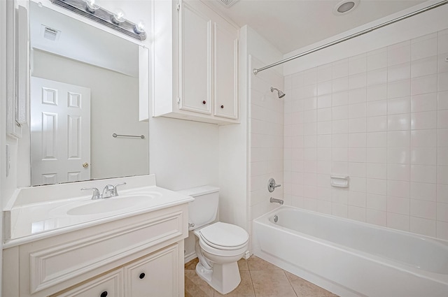 bathroom featuring visible vents, toilet, tile patterned flooring, tub / shower combination, and vanity