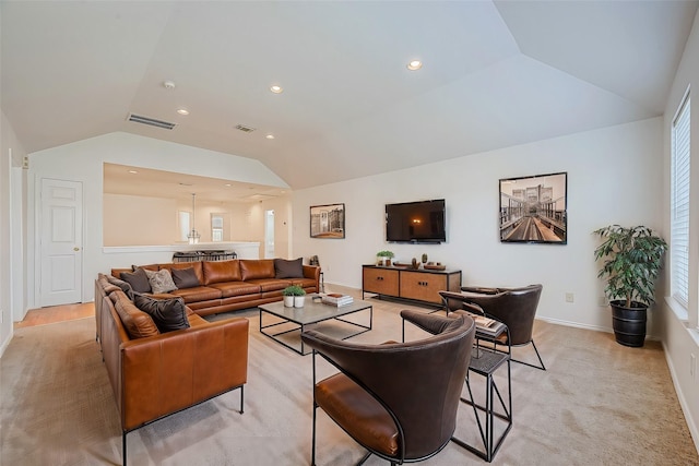 living room featuring recessed lighting, visible vents, and lofted ceiling