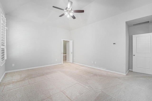 unfurnished room featuring ceiling fan, light colored carpet, and high vaulted ceiling