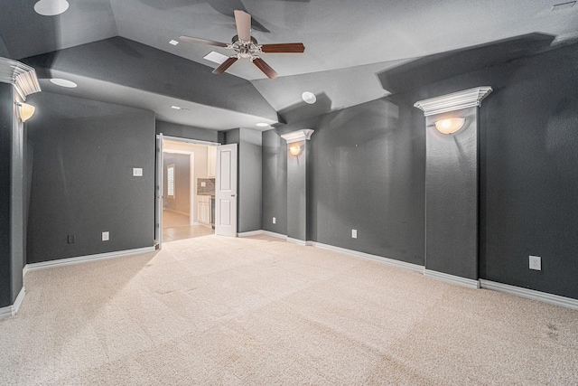 interior space with ceiling fan and lofted ceiling