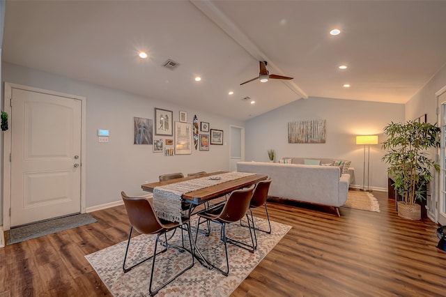 dining space featuring wood-type flooring, vaulted ceiling with beams, and ceiling fan