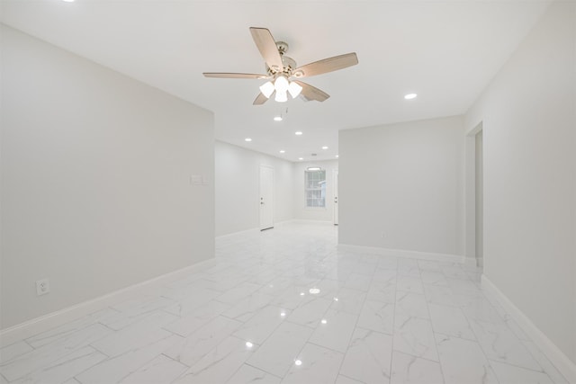 spare room featuring ceiling fan