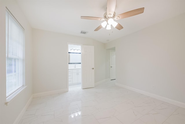 empty room featuring ceiling fan