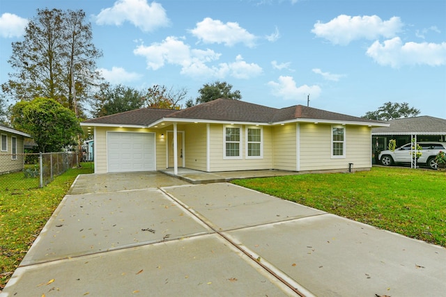 single story home featuring a garage and a front yard