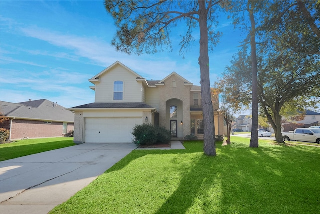 view of front property with a garage and a front lawn