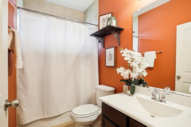 full bathroom featuring shower / bath combo, vanity, and toilet