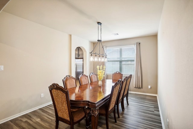 dining room featuring dark hardwood / wood-style flooring