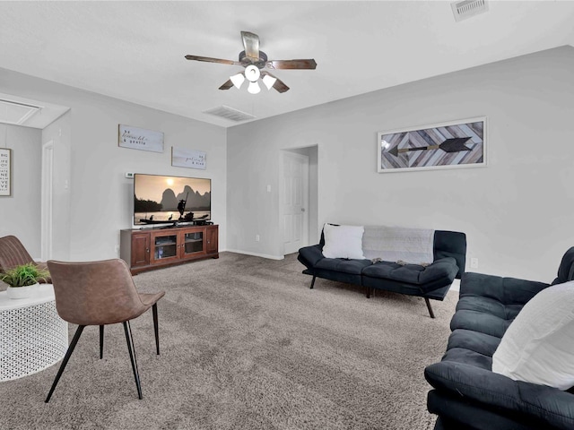 living room featuring carpet flooring and ceiling fan