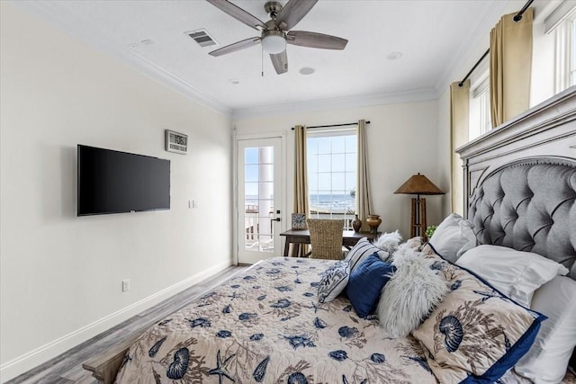 bedroom with wood-type flooring, ceiling fan, and ornamental molding