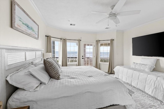 bedroom featuring ceiling fan and crown molding