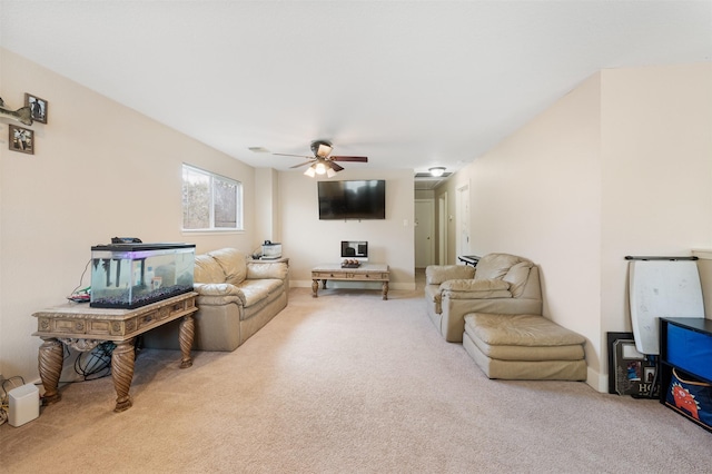 living room featuring ceiling fan and light colored carpet