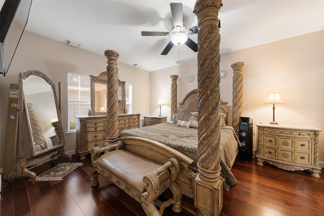 bedroom featuring ceiling fan and dark hardwood / wood-style floors