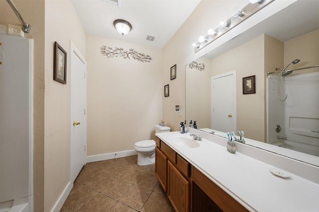 full bathroom featuring toilet, vanity, bathing tub / shower combination, and tile patterned floors