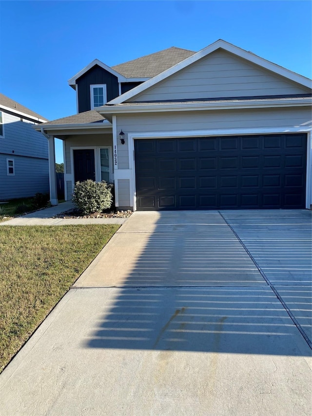 view of front of property featuring a garage