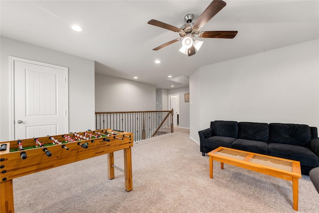 playroom featuring ceiling fan and carpet floors