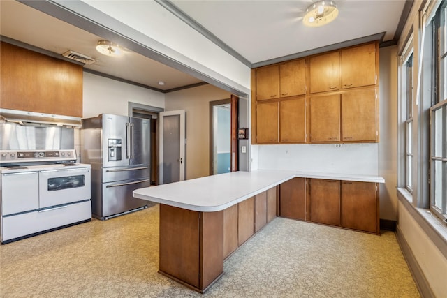 kitchen featuring white range with electric cooktop, ventilation hood, crown molding, stainless steel fridge, and kitchen peninsula