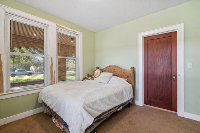 bedroom with light carpet