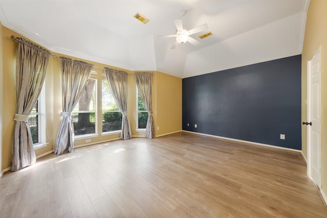 unfurnished room featuring ceiling fan, light wood-type flooring, and vaulted ceiling