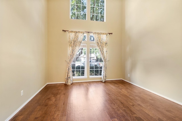 spare room featuring hardwood / wood-style flooring