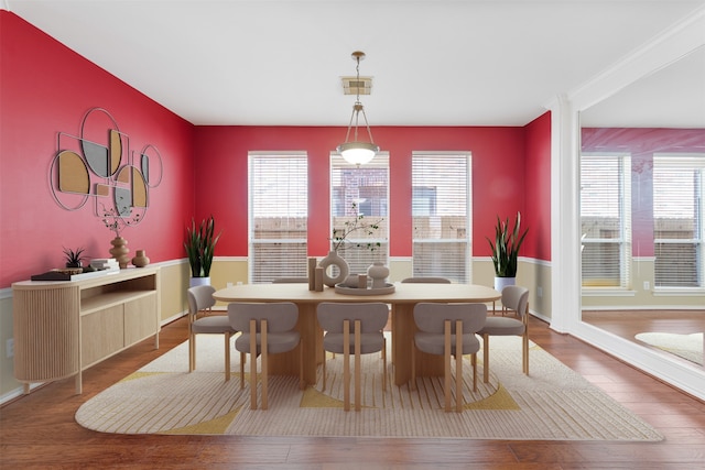 dining room with hardwood / wood-style flooring