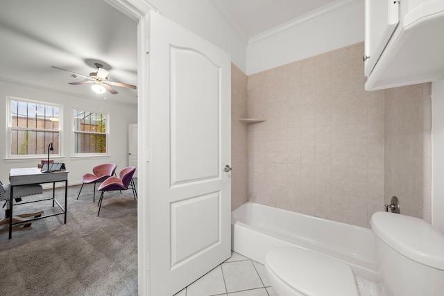 bathroom with ceiling fan, tile patterned floors, bathing tub / shower combination, toilet, and ornamental molding