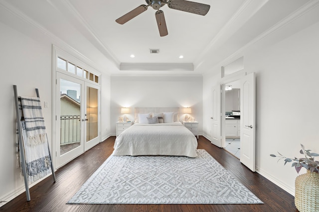 bedroom with french doors, a raised ceiling, ceiling fan, crown molding, and dark hardwood / wood-style floors