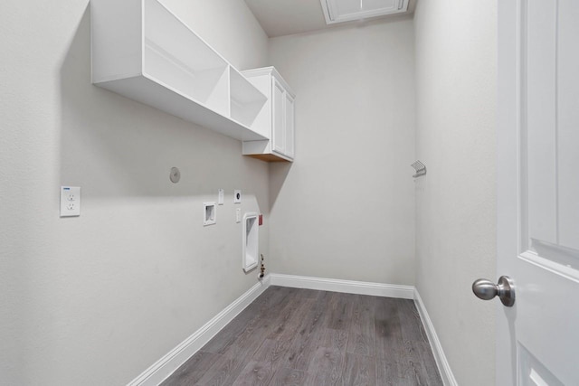 clothes washing area with cabinet space, baseboards, hookup for a gas dryer, dark wood-style floors, and electric dryer hookup