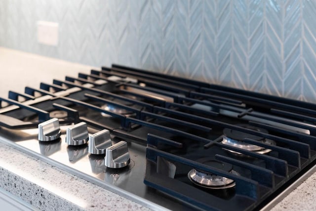 interior details with stainless steel gas stovetop