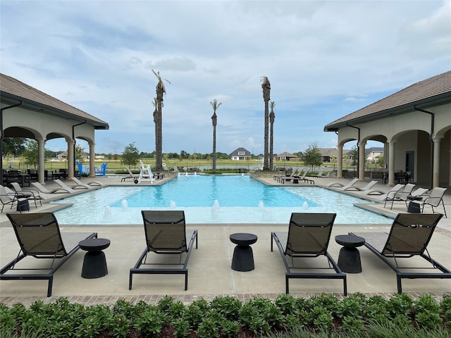 community pool featuring a patio