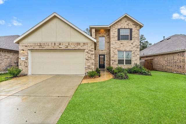 view of front property with a front lawn and a garage